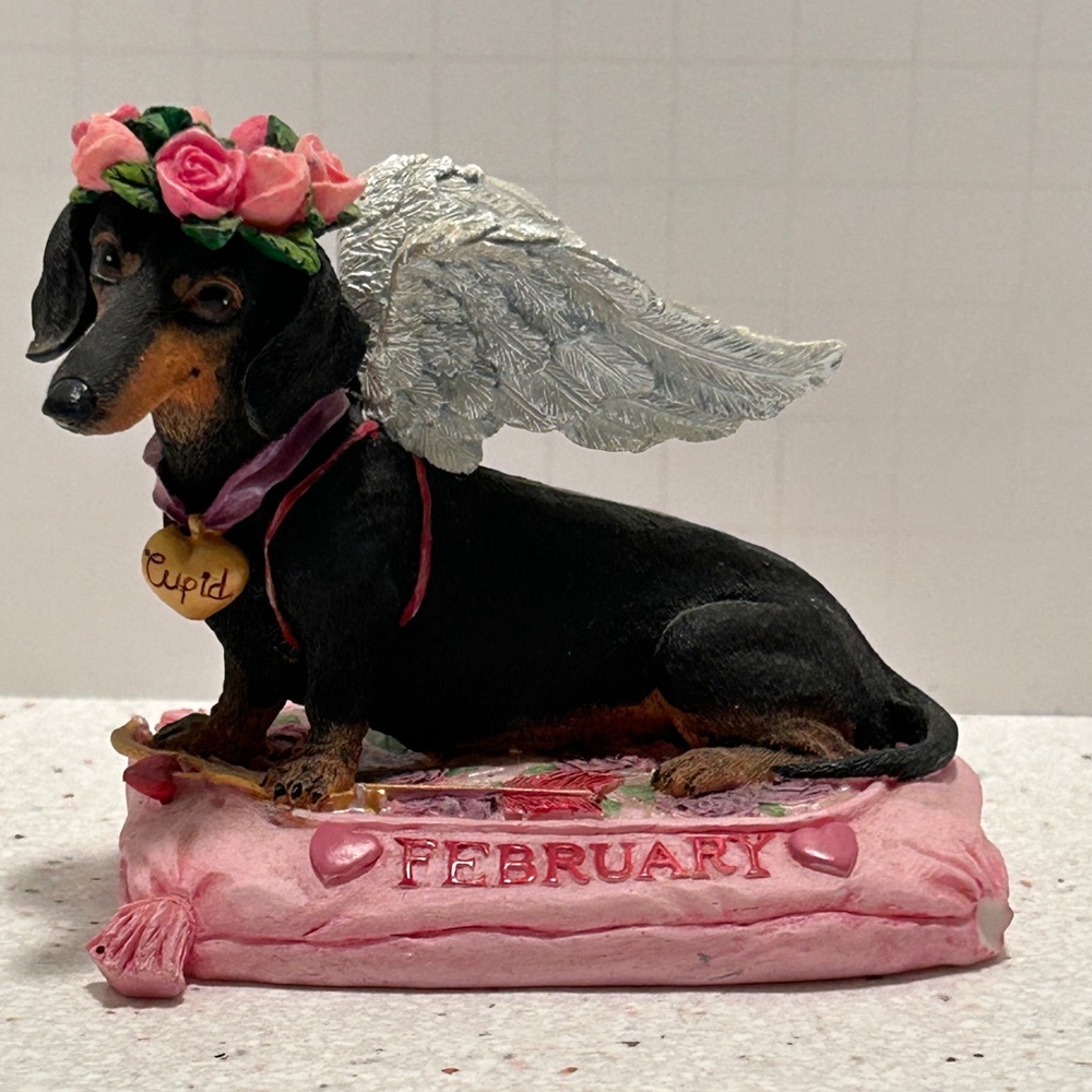 Danbury Mint Dachshund- February & Sept only. Sept was repaired in the ear.